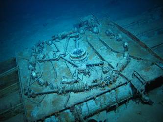 Quadruple torpedo tube mount on seabed - roller bearings visible